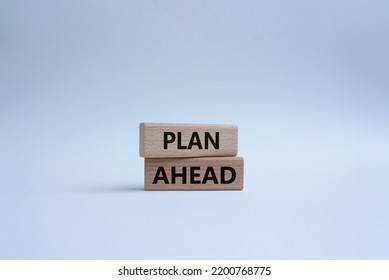 Plan Ahead Symbol. Wooden Blocks With Words Plan Ahead. Beautiful White Background. Businessman Hand. Business And Plan Ahead Concept. Copy Space.