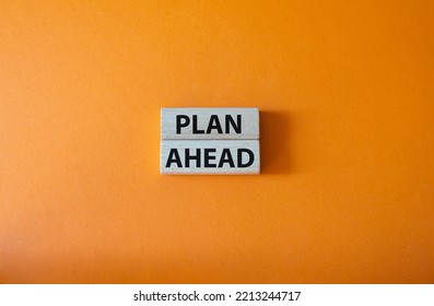 Plan Ahead Symbol. Wooden Blocks With Words Plan Ahead. Beautiful Orange Background. Business And Plan Ahead Concept. Copy Space.