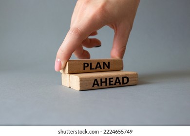 Plan Ahead Symbol. Wooden Blocks With Words Plan Ahead. Beautiful Grey Background. Businessman Hand. Business And 'Plan Ahead' Concept. Copy Space.