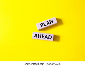 Plan Ahead Symbol. Wooden Blocks With Words Plan Ahead. Beautiful Yellow Background. Business And 'Plan Ahead' Concept. Copy Space.