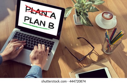 Plan B     (Cross plan A, underline plan B concept) man hand on table Business, coffee, Split tone