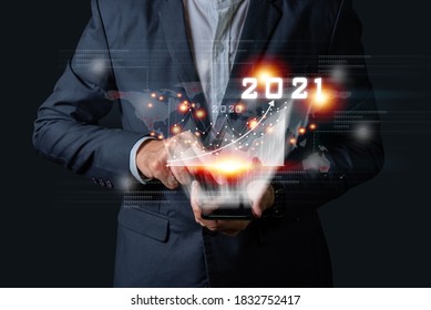 Plan business growth in year 2021 concept. Businessman plan and increase of positive indicators in his business, Growing up business concepts.