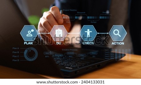 Plan Do Action Check PDCA continuous quality improvement model concept. Businessman  check the the Do on virtual screen, the strategy to success target.