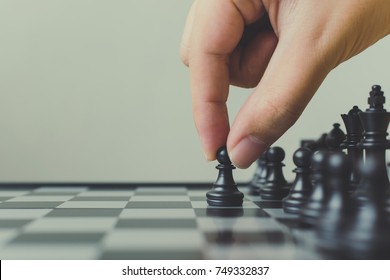 Plan Leading Strategy Of Successful Business Leader Concept, Hand Of Player Chess Board Game Putting Black Pawn, Copy Space For Your Text