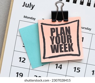 PLAN YOUR WEEK on a small sheet of paper in a calendar.