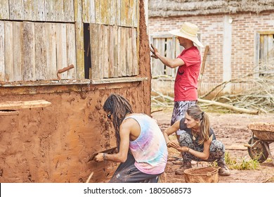 Planalto, RS / Brazil - October 2018 : Unidentified People Working On Permaculture, Grounding, Cemeting An Indigenous Building, Natural Bioconstruction Activitie, Union, Mud, Ground, Task Force