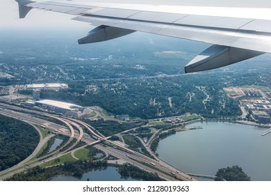 Plane Aerial Drone View Of Cityscape Near Oxon Hill In Washington DC With I495 Highway Capital Beltway Outer Loop With Traffic Cars And Buildings