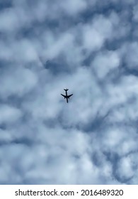 Plane in the blue cloudy sky!