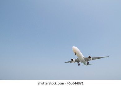 plane in a cloudless sky