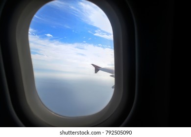 The plane flies on the clouds.