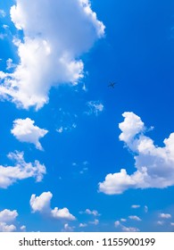 Plane Flies through the Clouds