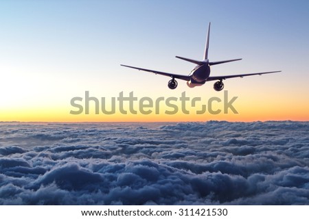 plane flying away in the sky