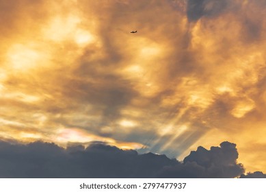 The plane is flying through the clouds.