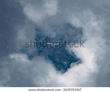 Plane flying through the clouds