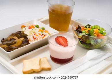 Plane Food Tray With Meat Meal, Salad, Guarana And Dessert