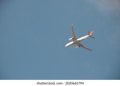 The Plane Goes To Somewhere With Its Passengers, Clear And Blue Sky Come Along Them