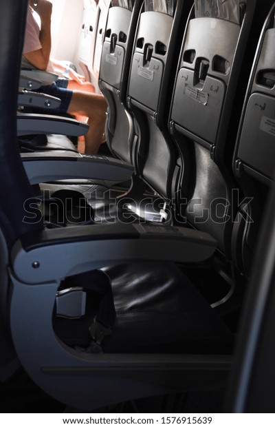 plane interior seats empty
chairs 