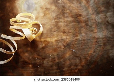 Plane jointer carpenter or joiner tool and wood shavings. Woodworking tools wooden table. Carpentry workshop - Powered by Shutterstock