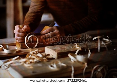 Plane jointer carpenter or joiner tool and wood shavings. Woodworking tools wooden table. Carpentry workshop