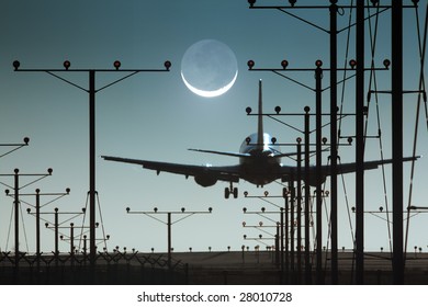 Plane Landing Or Departing In Airport At Night