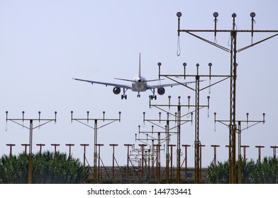 Plane Landing At Malaga Airport.