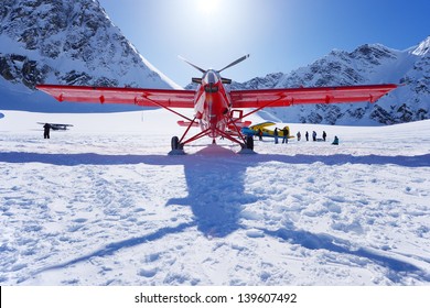 A Plane Landing On Glacier In Alaska