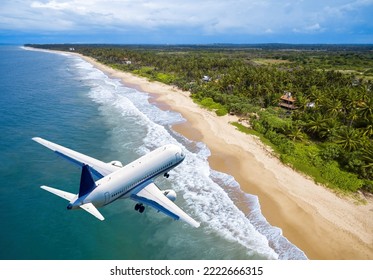 Plane landing at tropical resort, jet flies over ocean beach and rainforest. Aerial view of airplane, water and jungle coast in summer. Theme of travel, vacation, sea, trip, weekend and tourism.