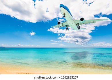 Plane At Maho Beach In St Maarten. Travel And Air Transportation Background.