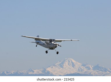 Plane with Mt. Baker in the back ground