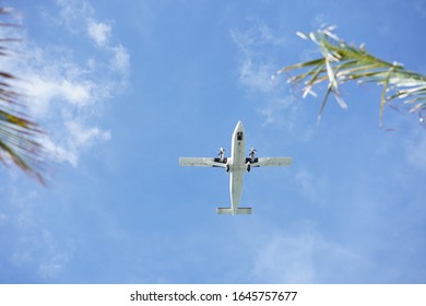 Plane Over Kona Hawaii Beach