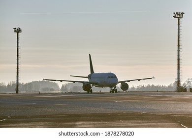 Plane Parked At An Airport, Storage With Cover On The Jet Engines