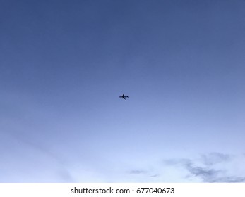 A plane in the sky alone