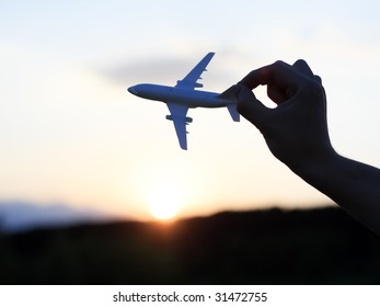  Plane At Sunset