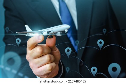 A plane taking off in the hands of a businessman and a pin location symbol. Business tourism. Organization of air traffic. Business class flights. Support financial program for civil aviation