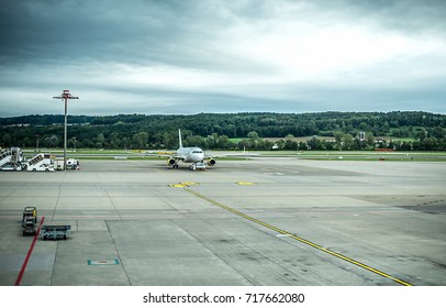 Plane waiting for departure next to the runway