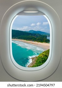 Plane Window Aerial View Of A Beach Phuket Thailand