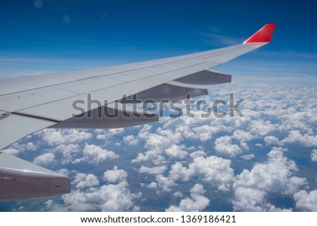 Plane wings and the sky View from the passenger window