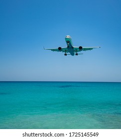 Planes Coming Into Land At St Maarten Airport Over The Beach 