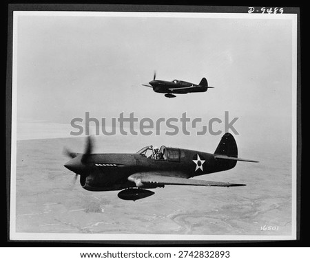 Planes in flight. The P-40 single-engine fighter plane--which the British have used in its various models as the 