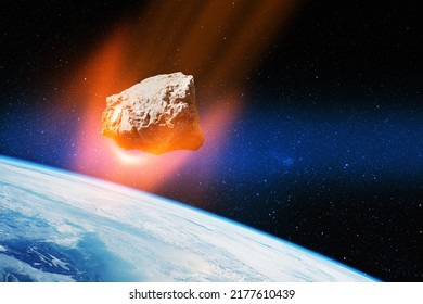 Planet Earth and big asteroid in the space. Potentially hazardous asteroids. Asteroid in outer space near Earth planet. Elements of this image furnished by NASA. - Shutterstock ID 2177610439