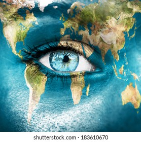 Planet earth and blue human eye - "Elements of this image furnished by NASA"