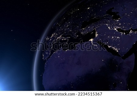 Planet Earth At Night. Africa, Europe, and Asia at night viewed from space with city lights. Italy, Germany, France, Spain, Turkey, Egypt, Israel, Saudi Arab. This image elements furnished by NASA. 