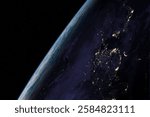 Planet Earth at night with continents and city light on the starry sky. China, Japan, North Korea, South Korea, Taiwan, Philippines, Vietnam and other countries. This image elements furnished by NASA.