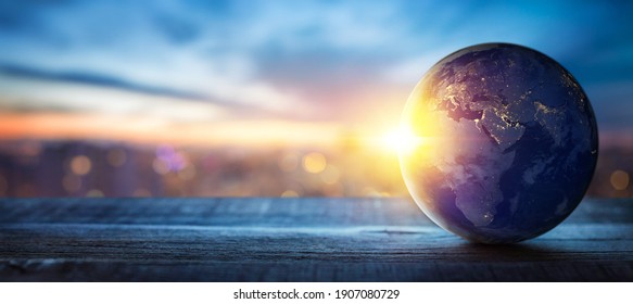 Planet Erde auf dem Hintergrund unscharfer Lichter der Stadt. Konzept für Wirtschaft, Politik, Ökologie und Medien. Earth Day abstrakter Hintergrund. Von der NASA bereitgestellte Elemente dieses Bildes