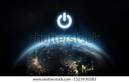 Planet Earth and power button. Earth hour event. Ecology. Elements of this image furnished by NASA