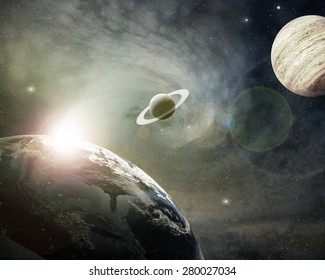 Planet Earth, Saturn And Jupiter In A Cosmic Cloud - Elements Of This Image Furnished By NASA