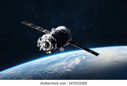 Planet Earth and space craft. Black background. Elements of this image furnished by NASA - Shutterstock ID 1472133305