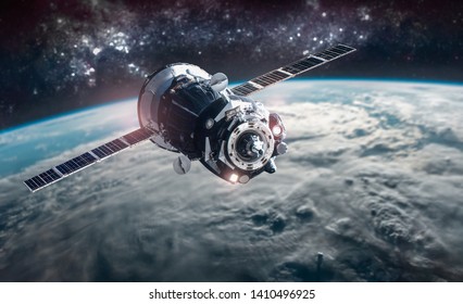 Planet Earth and space craft view. Stars and planet unfocused. Elements of this image furnished by NASA - Shutterstock ID 1410496925
