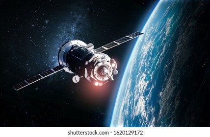 Planet Earth and space ship. Space art wallpaper. Elements of this image furnished by NASA - Shutterstock ID 1620129172
