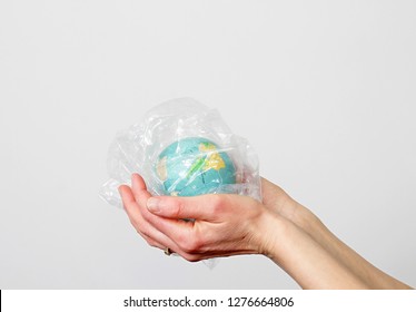 planet earth trapped in a sea of plastic waste that is bad for the environment stock photo - Powered by Shutterstock